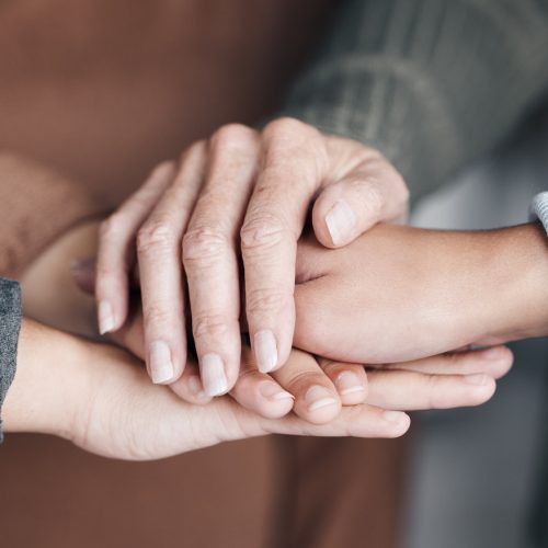 People, hands and care in trust for unity, collaboration or agreement together in solidarity. Hand